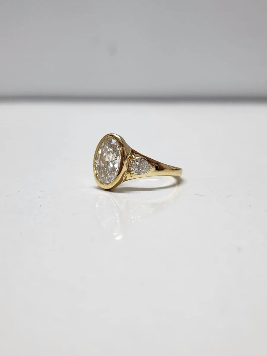 Three Hour Block oval bezel custom engagement ring